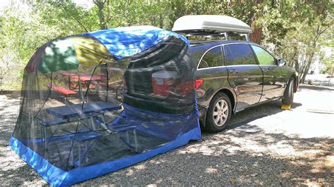 The Tailveil Is A Tailgate Tent That Attaches To The Back Of Your Suv