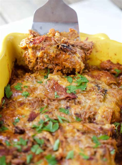 Tender pulled pork rolled in corn tortillas and. Smoked Pulled Pork Enchiladas and Smoker Recipes for Cinco ...