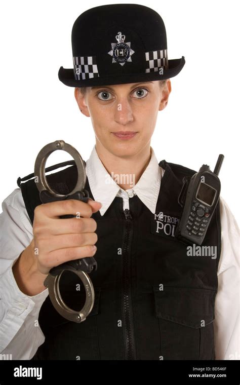 Woman Police Officer With Stern Look Showing Handcuffs About To Arrest