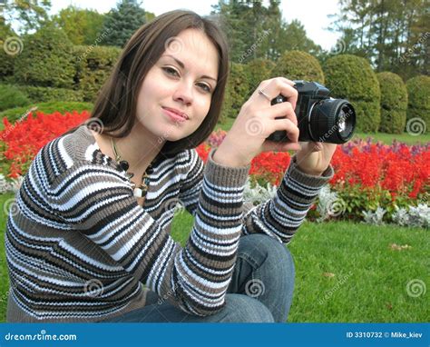 Young Woman With Camera Stock Photo Image Of Grass Flowers 3310732