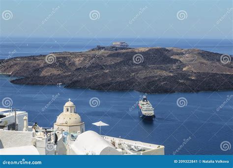 View Of Santorini Island Caldera And Cruise Ship In The Waters Of The