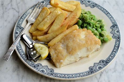 Battered cod and chunky chips (fries to american readers), traditionally served. Pin på British cuisine