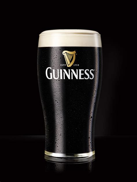 Locally brewed cask ale at the pub 500g co2e: Guinness | Carib Brewery