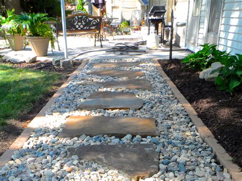 Garden edging creates a neat, trim appearance and serves a functional purpose in the garden, saving labor by keeping grass out of flower beds and garden areas. Flagstone & Gravel Walkway I
