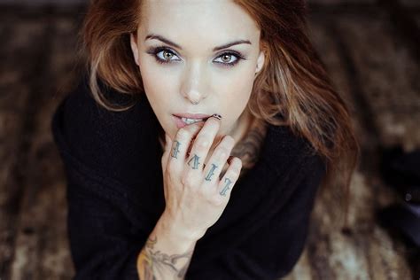Brown Haired Girl With A Pierced Nose And Tattoos On Arm Wallpapers And Images Wallpapers