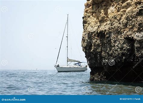 Yacht Sailing By Cliff Stock Image Image Of Rocks Rocky 6221619