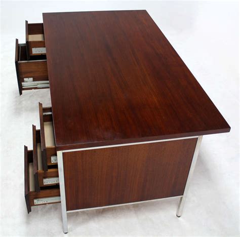 This stylish home office desk offers an ample desk space together with an additional flip. Walnut and Aluminum Mid-Century Modern Large Executive ...