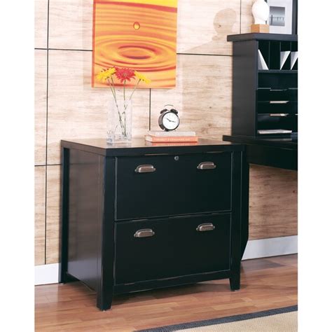 File drawers accommodate letter size or legal size hanging files with full extension, heavy duty glides for durability and easy file access. Shop Tansley Landing Black 2-drawer Lateral File Cabinet ...