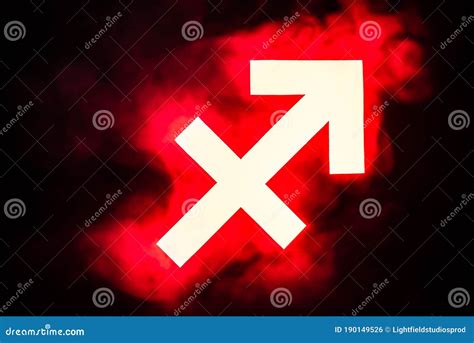 Red Illuminated Sagittarius Zodiac Sign With Smoke Royalty Free Stock