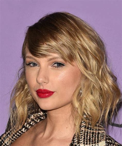 Taylor Swift Medium Wavy Brunette Hairstyle With Side Swept Bangs And