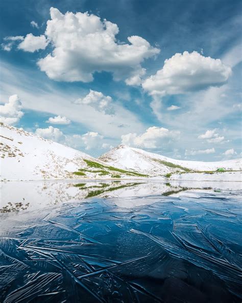 Frozen Mountain Lake With Blue Ice Stock Image Image Of Cracks