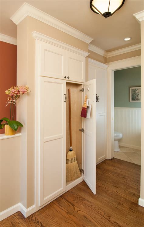 Janitorial cabinets organize maintenance and cleaning supplies including space for brooms, mops and vacuum cleaners in residential, commercial and industrial environments. Cleaning Supplies' Storage Solution • Queen Bee of Honey Dos