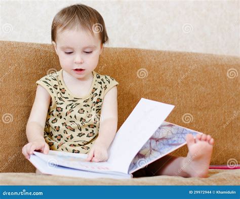 Beautiful Cute Baby Reading A Book Stock Photo Image Of Feet