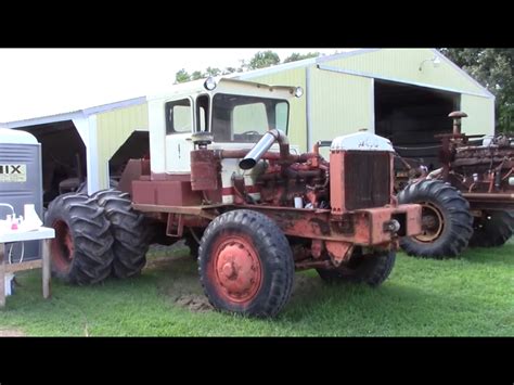 Old Red Tractor With Large Tires
