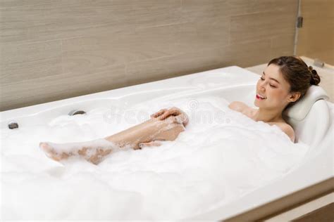 woman relaxing and takes bubble bath in bathtub with foam stock image image of bubble