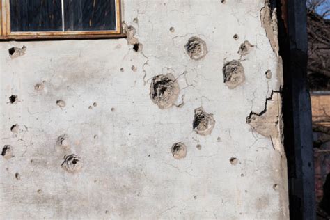 Bullet Holes Wall Stock Photos Pictures And Royalty Free Images Istock