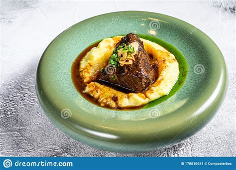 When buying a whole tenderloin for a dinner party, i prefer to buy the. Beef Tenderloin Steak With Mashed Potatoes. White Background. Top View Stock Image - Image of ...