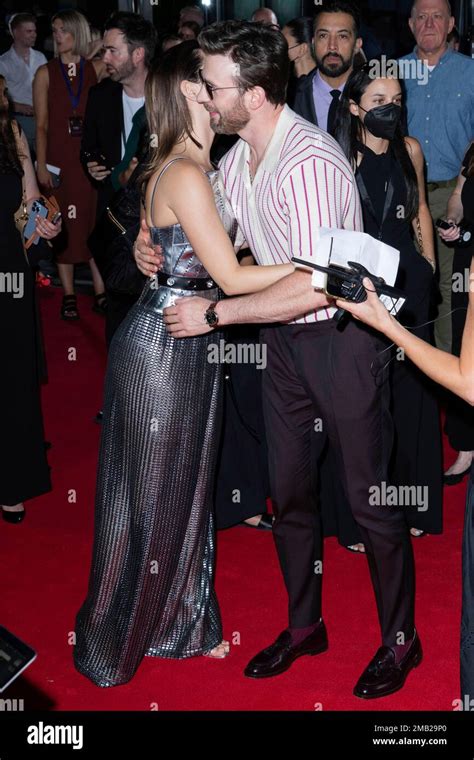 Ana De Armas And Chris Evans Hug As They Pose For Photographers Upon