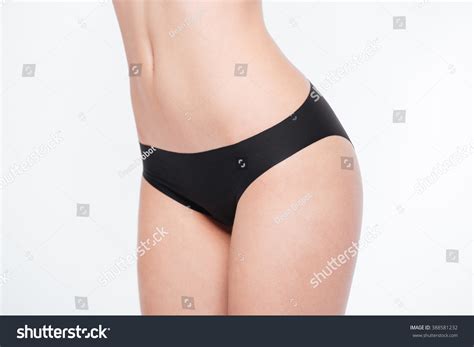 Closeup Portrait Of A Sexy Female Hips Isolated On A White Background