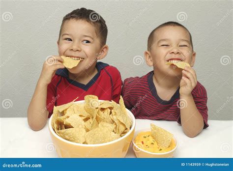 Kids Eating Chips Royalty Free Stock Images Image 1143959