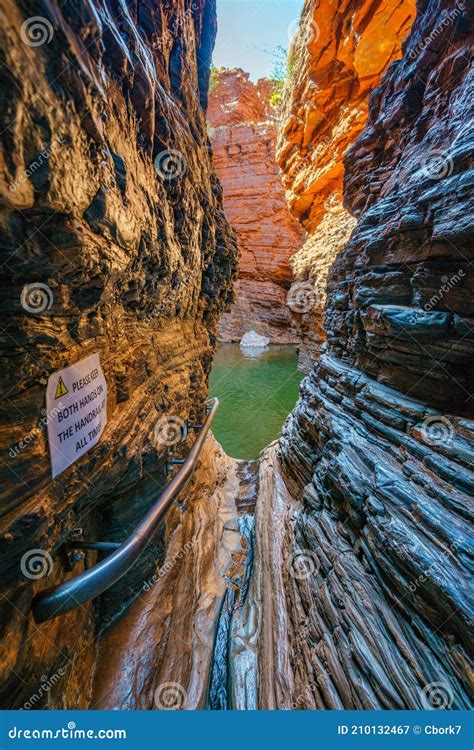 hiking to handrail pool in the weano gorge in karijini national park western australia 23 stock