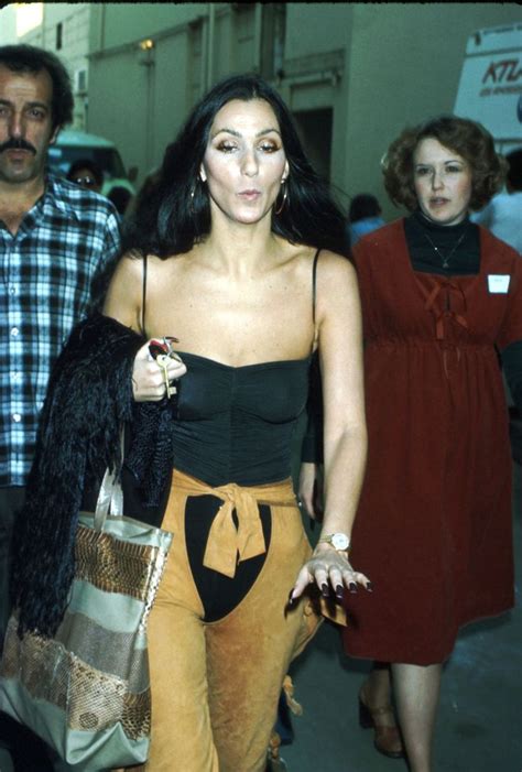 Cher S Most Iconic Fashion Moments Over The Last 6 Decades Cher Outfits Cher Looks Fashion Inspo