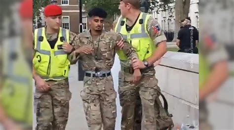 video shows british soldier being arrested for opposing uk arming of saudi arabia thealtworld