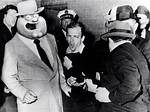 Jack Ruby shooting Lee Harvey Oswald who is being escorted by Dallas ...
