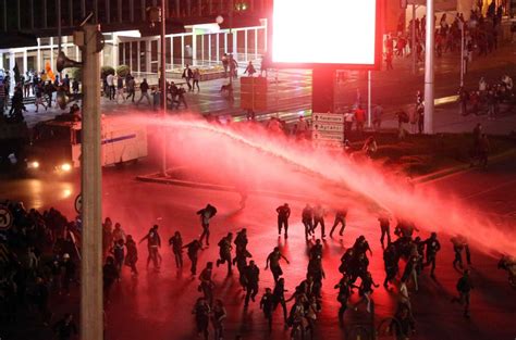 Police Fire Tear Gas To Disperse Crowds Gathered To Denounce Protester