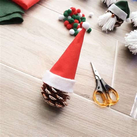 Easy Diy Pine Cone Santas The Weight Of My Worlds