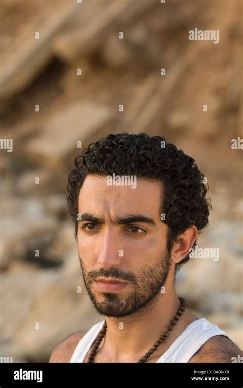 Young Arabic Man Looking Away Outdoors Stock Photo Alamy