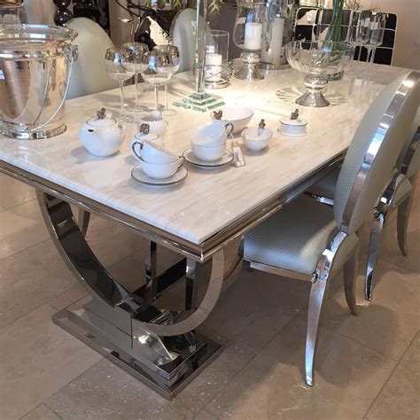 Custommade dining tables are handcrafted by american artisans with quality made to last. Cream Marble and Chrome Dining Table with U-Shaped Legs ...