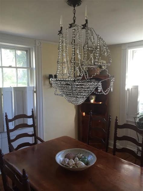 This was one of four turquoise chandeliers in yesterday's post, but i couldn't stop thinking about it. Ship chandelier in Nantucket | Canopy design, Chandelier ...