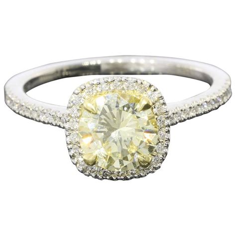 Of course, yellow diamonds are more than just an attractive, flavor of the month alternative to traditional engagement rings. Fancy Light Yellow Canary Diamond gold platinum Halo Ring ...