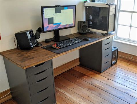 Because the grille is wider than the cabinet, the slot also allows cables to run between the cabinets. The ultimate IKEA Battlestation desk setup | Rigz