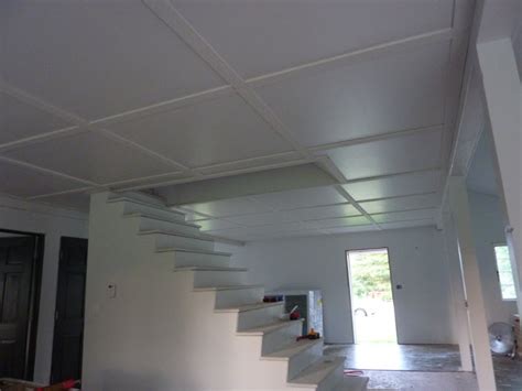Also, i went with floor to ceiling board and batten. Low Budget DIY Plywood Plank Floors | DiyDork.com