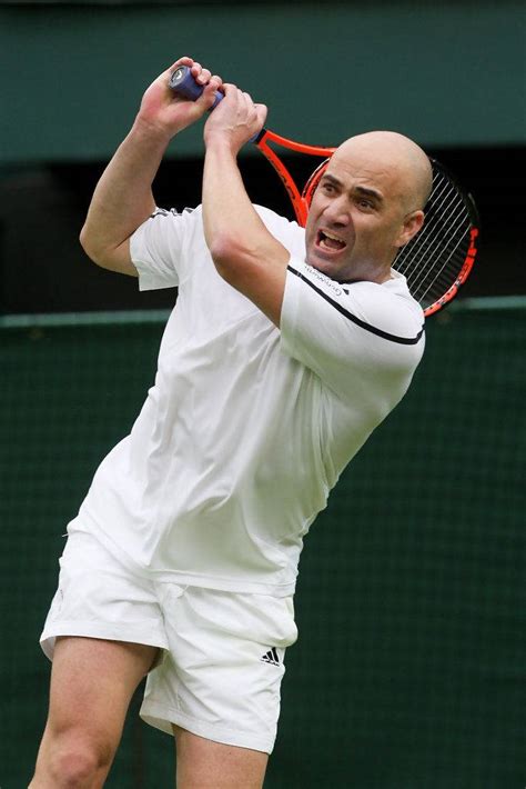 Download Andre Agassi In White Tennis Outfit Wallpaper