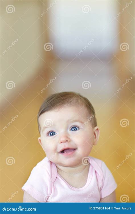 Shes Just Too Cute Portrait Of An Adorable Baby Girl Sitting On The
