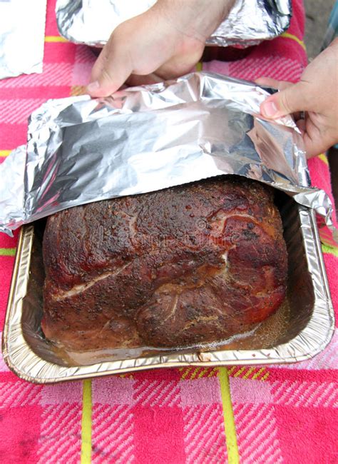 Wrap pork with bacon slices, and secure with wooden picks. Cooked Pork Roast Being Pulled By Gloved Hands Stock Photo - Image of pork, poured: 44281938
