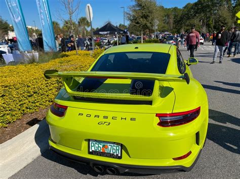 The Rearend Of A Bright Green Porsche Gt3 At A Free Car Show In A