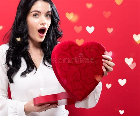 Happy Young Woman Holding A Big Heart T Box Stock Image Image Of Holiday Heart 107778073