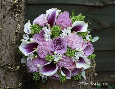 If purple is one of your wedding colors, you will want a beautiful purple bouquet for your special day. Wedding Flowers Blog: Liz's Elegant Mauve and Green Autumn ...