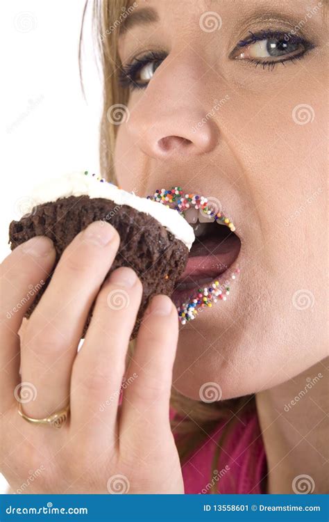 Woman Eating A Cupcake Stock Image Image Of White Cake 13558601