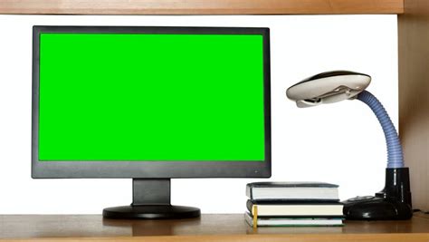 Monitor With A Green Screen On The Computer Desk For Your Own Custom