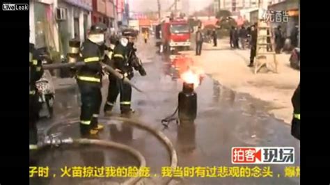 Chinese Fireman Carries Out Flaming Propane Tank Youtube