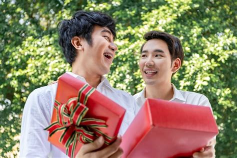 Premium Photo Sweet Moment Of Love Portrait Of Asian Homosexual Couple Hug And Surprise Box