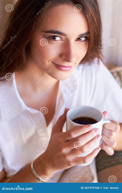 Portrait Woman Drink Her Coffee In The Morning And Thinking On Sofa In