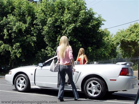 Two Girls Ford Mustang Cranking In High Heels