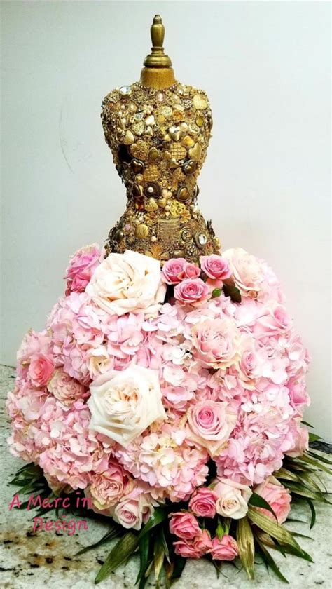 We understand losing a loved one is an emotional and difficult experience. Gold jewelry mannequin with pink floral skirt | Same day ...