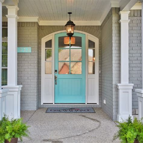We personally love a black front door with large panes of glass and wood shutters. Set The Stage | House of Turquoise | Bloglovin'